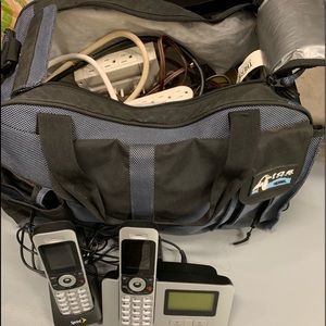 Bag with misc electrical cords, Sprint home phone.